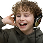 Boy smiling with headphones