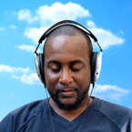 Man with headphones blue background