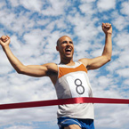 runner man,  passing through finishing line & ribbon